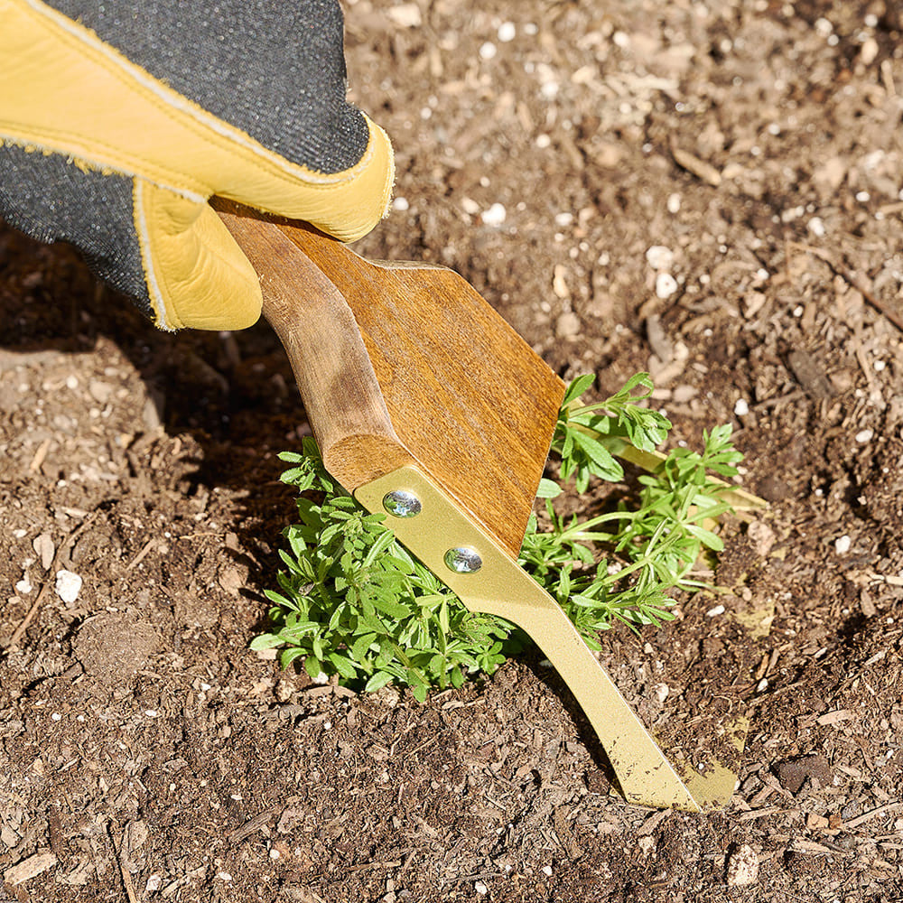 Azada de jardín compacta para desmalezar con una sola mano
