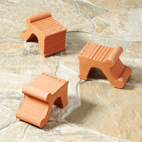 Patas tradicionales de terracota para macetas elevadoras de jardineras grandes de arcilla natural